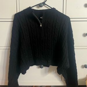 Cable knit black cropped quarter zip sweater from Garage. Size Medium.